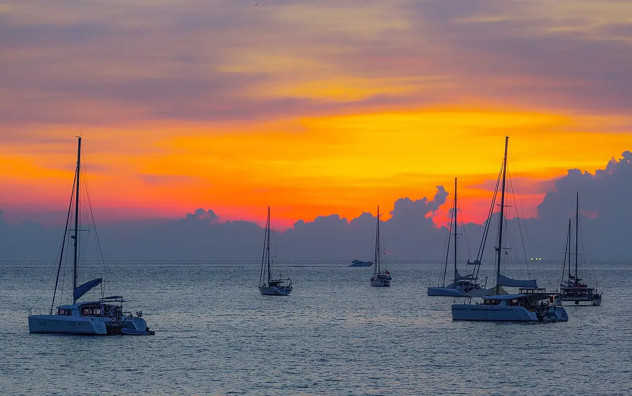 Sunset over Nai Harn Beach in Phuket
