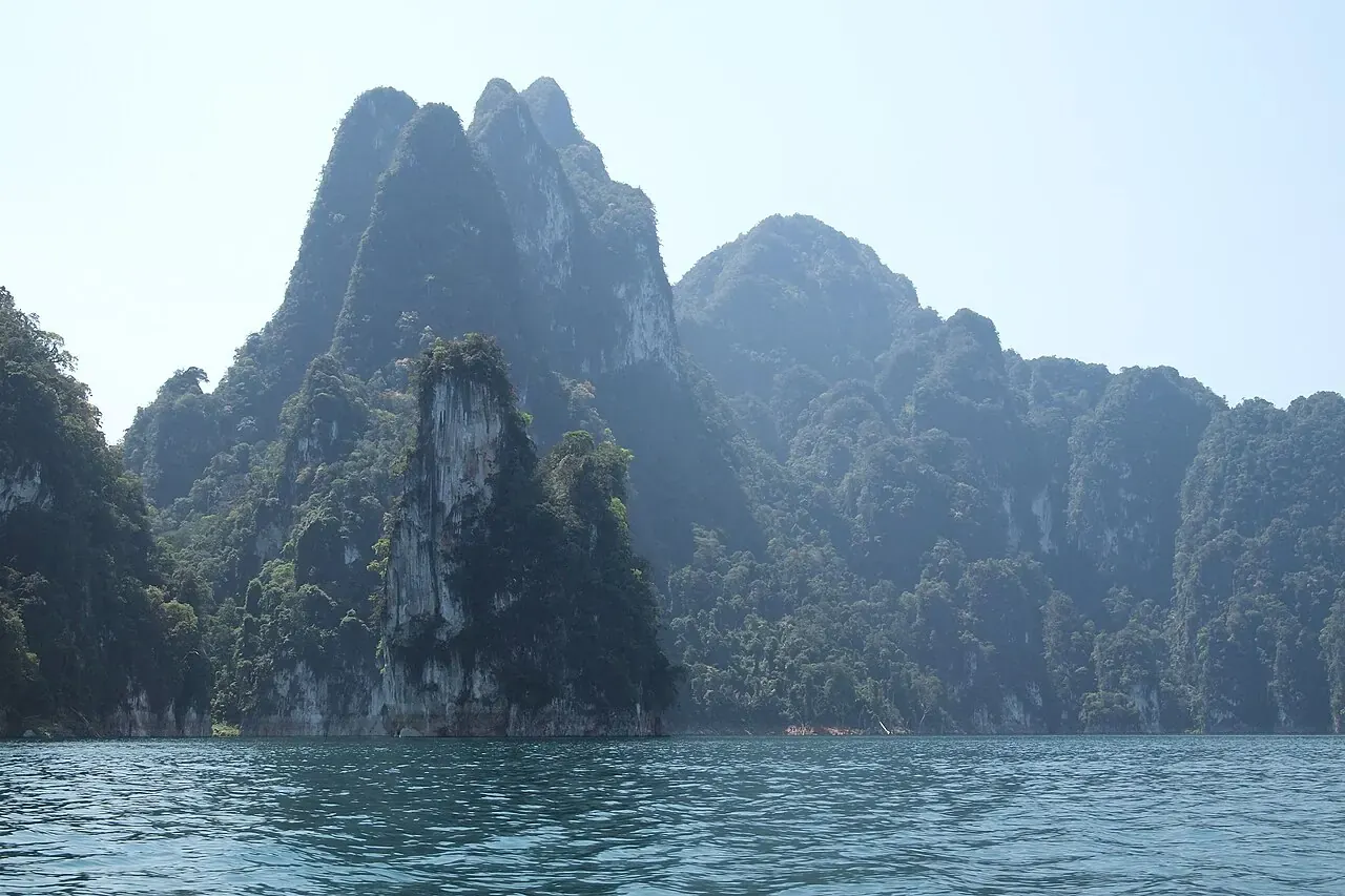 Limestone karsts rising above Cheow Lan Lake in Khao Sok